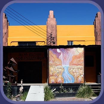 Solar Culture - a colorful mural on the side of a building - Art Galleries Near Me - Tucson, Arizona