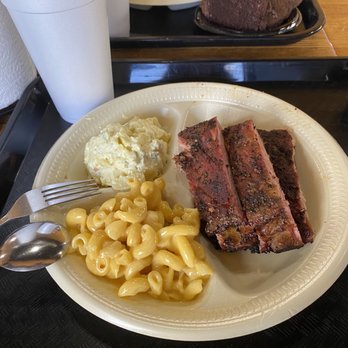 Backwoods BBQ - Pork ribs, mac and cheese, and potato salad. Also got banana pudding! - Barbeque Near Me - Fredericksburg, Texas