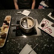 Photo of The Melting Pot - Buffalo, NY, United States. Yin &amp; Yang chocolate fondue + bonus chocolate dipped strawberries