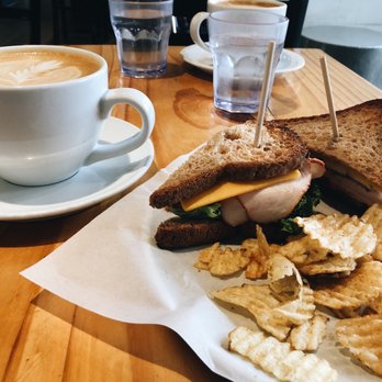 Sola Coffee Cafe - Maple cinnamon Oatmilk latte + Sola turkey on gluten free bread - Coffee & Tea Near Me - Raleigh, North Carolina