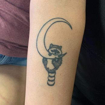 Queens Gold Tattoo Parlor - My trash panda hanging from a crescent moon - Tattoo Near Me - Sanger, California