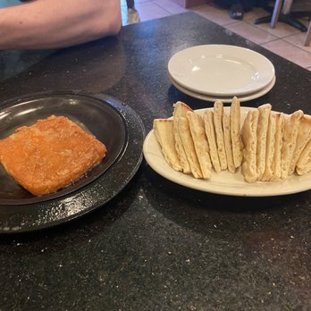 The Mad Greek - Flaming cheese - Italian Near Me - Lawrence, Kansas The Mad Greek - Flaming cheese - Italian Near Me - Lawrence, Kansas