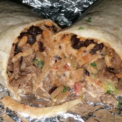 Moe's Southwest Grill - Homewrecker with steak. Rice, black beans, grilled onions and peppers, cheese, lettuce, pico, cilantro, sour cream and guac