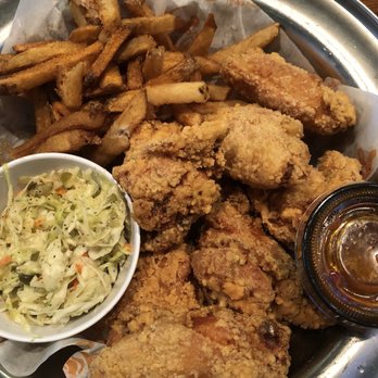 Yo' Mama's - Fried wings plate with fries and slaw. Hot wing sauce on the side. - Gluten-Free Near Me - Birmingham, Alabama