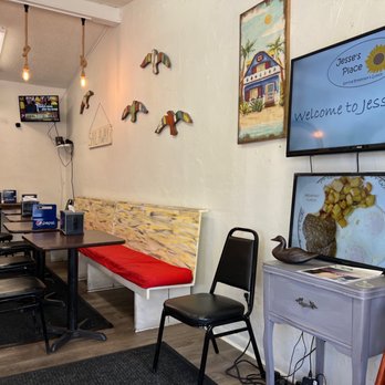 Jesse's Place - a dining area with a flat screen tv - Breakfast & Brunch Near Me - Panama City Beach, Florida Jesse's Place - a dining area with a flat screen tv - Breakfast & Brunch Near Me - Panama City Beach, Florida