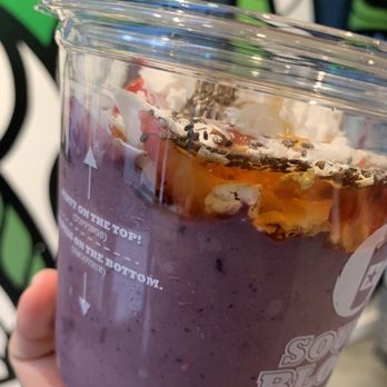 South Block - a hand holding a purple smoothie - Acai Bowls Near Me - Arlington, Virginia
