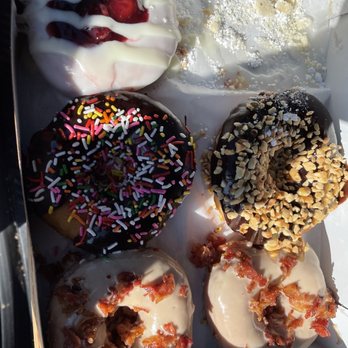 Duck Donuts - Cheesecake, chocolate and sprinkles, chocolate and toffee nuts, bacon and maple - Donuts Near Me - Kill Devil Hills, North Carolina