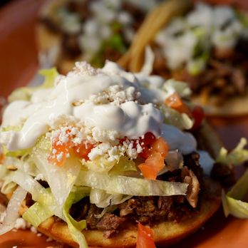 El Rey Taco Grill - two tacoss on an orange plate - Mexican Near Me - Fontana, California El Rey Taco Grill - two tacoss on an orange plate - Mexican Near Me - Fontana, California
