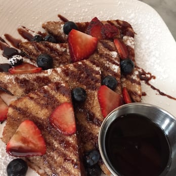 Orange Blossom - French toast. You would think that nutella, cinnamon, fruit, and syrup would be too much. It's not. - Breakfast & Brunch Near Me - Miami Beach, Florida