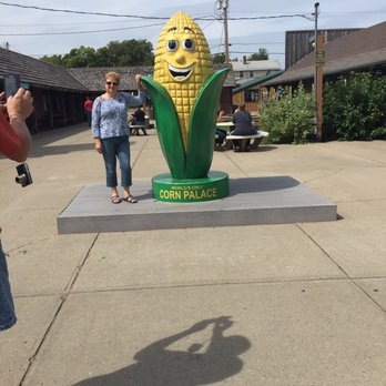 Corn Palace - A giant corn and a random human. - Museums Near Me - Mitchell, South Dakota Corn Palace - A giant corn and a random human. - Museums Near Me - Mitchell, South Dakota