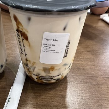 Thirstea - a cup of iced coffee on a table - Bubble Tea Near Me - Mississauga, Ontario Thirstea - a cup of iced coffee on a table - Bubble Tea Near Me - Mississauga, Ontario