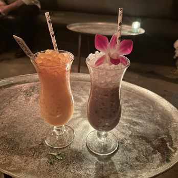 Test Pilot - Thai tea & ube Piña colada (I hadn't taken a sip yet, you can see the amount of ice) - Tiki Bars Near Me - Santa Barbara, California Test Pilot - Thai tea & ube Piña colada (I hadn't taken a sip yet, you can see the amount of ice) - Tiki Bars Near Me - Santa Barbara, California