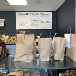 Bagels and Bliss - Menu and pastry display