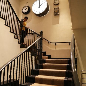 Eichardt's - The stairs of Eichardt's Private Hotel. with nice clocks background. - Bars Near Me - Queenstown, OTA