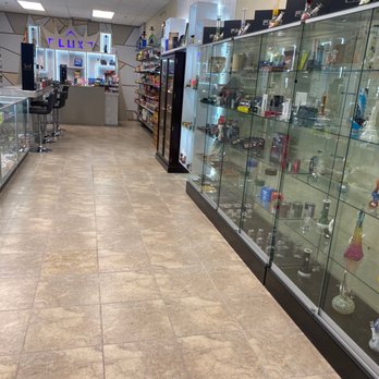 Lux Smoke - an empty store with glass display cases - Tobacco Shops Near Me - Tampa, Florida Lux Smoke - an empty store with glass display cases - Tobacco Shops Near Me - Tampa, Florida