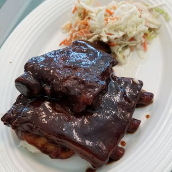 Flo's V8 Cafe - BBQ ribs laid on top of mash potatoes with a side of coleslaw - Cafes Near Me - Anaheim, California