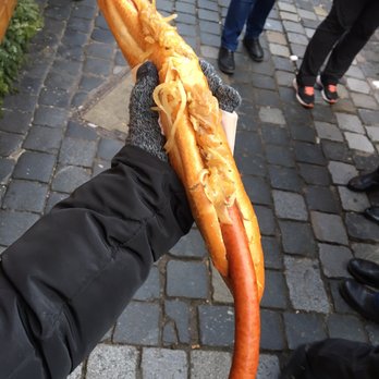 Nürnberger Christkindlesmarkt - 1/2 meter bratwurst, juicy sausage on a crunchy bread roll! - Christmas Markets Near Me - Nuremberg, BY Nürnberger Christkindlesmarkt - 1/2 meter bratwurst, juicy sausage on a crunchy bread roll! - Christmas Markets Near Me - Nuremberg, BY