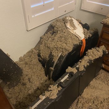 Drywall Perfection - a bed in the middle of a room - General Contractors Near Me - Surprise, Arizona