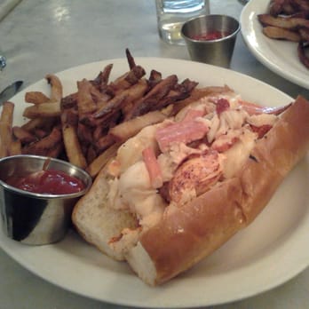 Neptune Oyster - Warm lobster roll with butter and fries on the side! - Seafood Near Me - Boston, Massachusetts Neptune Oyster - Warm lobster roll with butter and fries on the side! - Seafood Near Me - Boston, Massachusetts