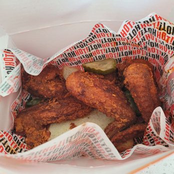 Howlin' Ray's - 3 wings with pickle and slice of bread - Southern Near Me - Los Angeles, California Howlin' Ray's - 3 wings with pickle and slice of bread - Southern Near Me - Los Angeles, California