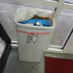 Cedar Hills Mart & Mail - Dirty trash can