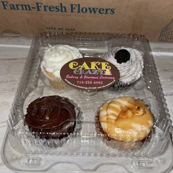 Vanilla, chocolate, cookies and cream, and caramel cupcakes