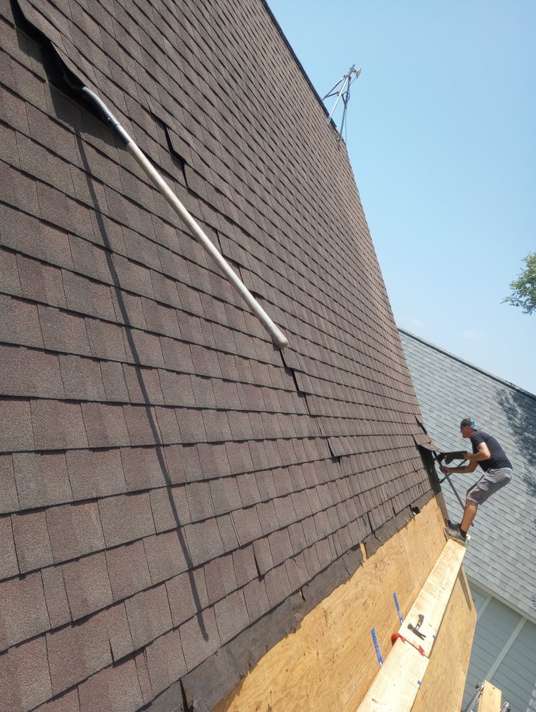 Slide of Lion Roofing