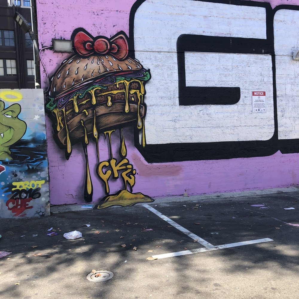 Ghost Mural - Dripping cheeseburger on each side. - Public Art Near Me - Oakland, California Ghost Mural - Dripping cheeseburger on each side. - Public Art Near Me - Oakland, California