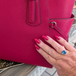 Unwind Nails & Bar - They worked hard to find just the right color to match my new purse. I really appreciate that dedication!