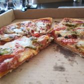 Photo of Razzo's Pizza and Salads - Oakland, CA, United States. Large pizza with pepperoni, mushrooms and half jalapenos