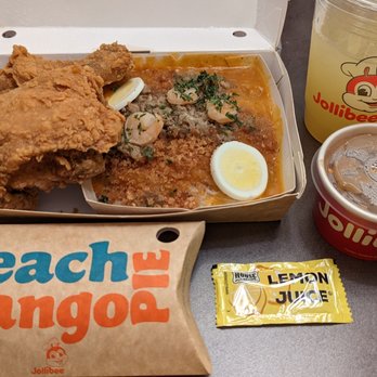 Jollibee - Palabok fiesta with 2 pcs Chickenjoy, pineapple quencher, peach mango pie - Fast Food Near Me - San Diego, California Jollibee - Palabok fiesta with 2 pcs Chickenjoy, pineapple quencher, peach mango pie - Fast Food Near Me - San Diego, California