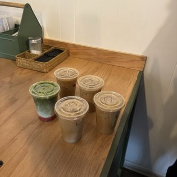 Doxie Coffee - Three Lincoln iced lattes, one lavender latte, one strawberry matcha - Coffee & Tea Near Me - Groves, Texas