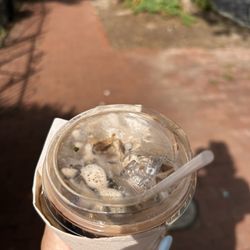 Wine & Butter Cafe & Market - Iced mocha with unknown green ball that was in my drink.