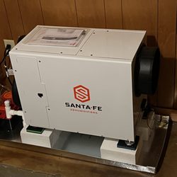 Comfortman - This is a smaller capacity commercial grade dehumidifier installation to solve basement moisture issues.