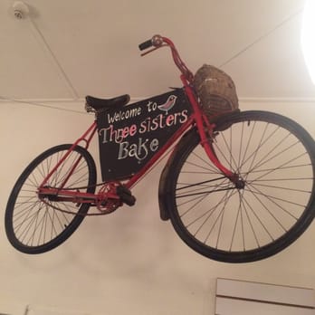 Three Sisters Bake - Cute suspended bicycle - Bakeries Near Me - Quarrier's Village, IVC