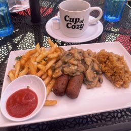 Vegan Mushroom Sausage, sauerkraut and fries. Vegan Mushroom Sausage, sauerkraut and fries.