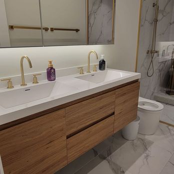 San Diego Construction - a bathroom with a marble floor - General Contractors Near Me