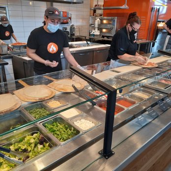 Blaze Pizza - Down the pizza assembly line. - Pizza Near Me - Fort Myers, Florida Blaze Pizza - Down the pizza assembly line. - Pizza Near Me - Fort Myers, Florida
