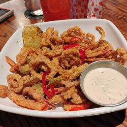 State & Main Kitchen & Bar - Chili coconut calamari $18 during Happy Hour