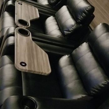 O'Neil Cinemas - Reclining seats with swiveling tray tables - Cinema Near Me - Littleton, Massachusetts