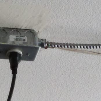 The Home Depot - Power source from existing receptacle to power overhead garage opener now provides power to sconces. Exposed 3/8 flex conduit - Hardware Stores Near Me - Upland, California