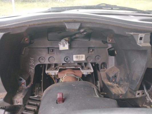 Odometer and dash bezel remove and replace - This odometer gauge had an electrical problem and needed to be replaced. The dash bezel trim was cracked in many places and needed to be replaced also.