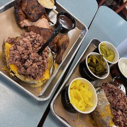 Double Barrel (loaded baked potatoes with chopped brisket) 1/2 smoked chicken and must have jalapeño/onions/pickles. Double Barrel (loaded baked potatoes with chopped brisket) 1/2 smoked chicken and must have jalapeño/onions/pickles.