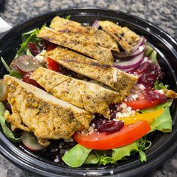 Dannlys Cuisine - Salad. This was so good, can't see all the yummy topics hiding under the chicken.