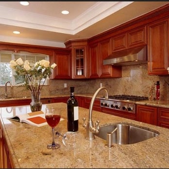 Genesis Construction - a kitchen with granite countertops - General Contractors Near Me Genesis Construction - a kitchen with granite countertops - General Contractors Near Me
