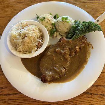 Der Lindenbaum - Schnitzel with mustard sauce, kraut amd potato salad. - German Near Me - Fredericksburg, Texas