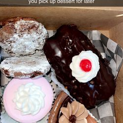 Merritt’s Bakery - Eclair Chocolate Cheesecake Crinkle cookies Turtle cookies "unicorn" Cheesecake