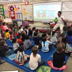 Huntington Smile Care - Dr. Dinh teaching Plavan Elementary students how to care for their teeth.