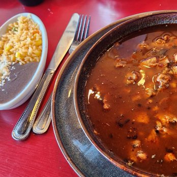 Frida’s Kitchen & Bar - A very healthy portion of pozole with all of the acoutrements. - Mexican Near Me - Bryan, Texas Frida’s Kitchen & Bar - A very healthy portion of pozole with all of the acoutrements. - Mexican Near Me - Bryan, Texas