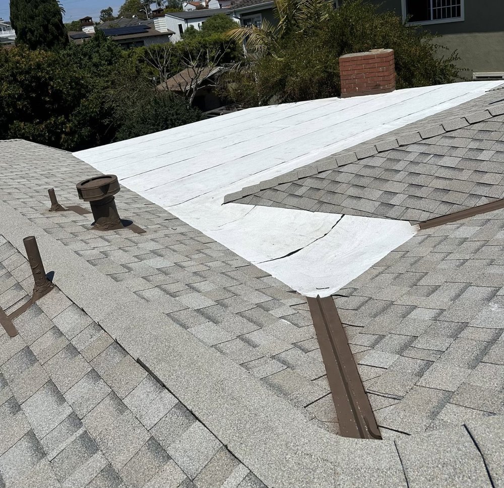 Slide of Alpha Roofing Group